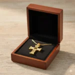 Stylized Gold Plated Cross Necklace with Textured Cutting Detail