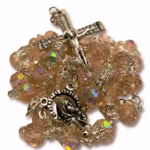 Silver-tone chain, centerpiece medallion, and crucifix